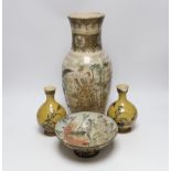 A 19th century Satsuma vase, two ochre pottery vases and a fish designed bowl, (purported to come