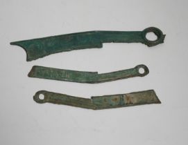 Seven Chinese bronze ‘knife’ cash, Han style