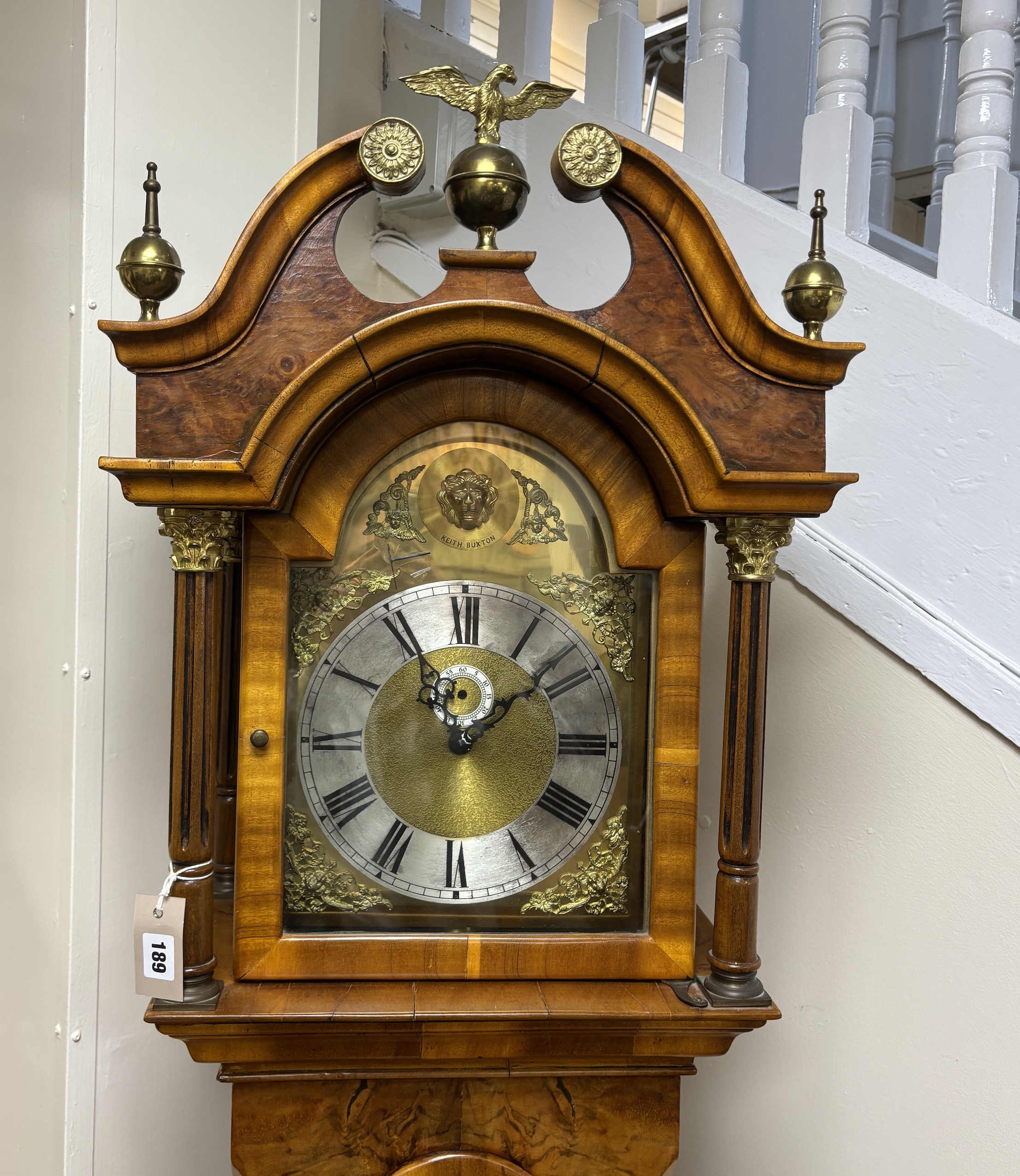 A reproduction yew Westminster chiming longcase clock, marked Keith Buxton, height 212cm