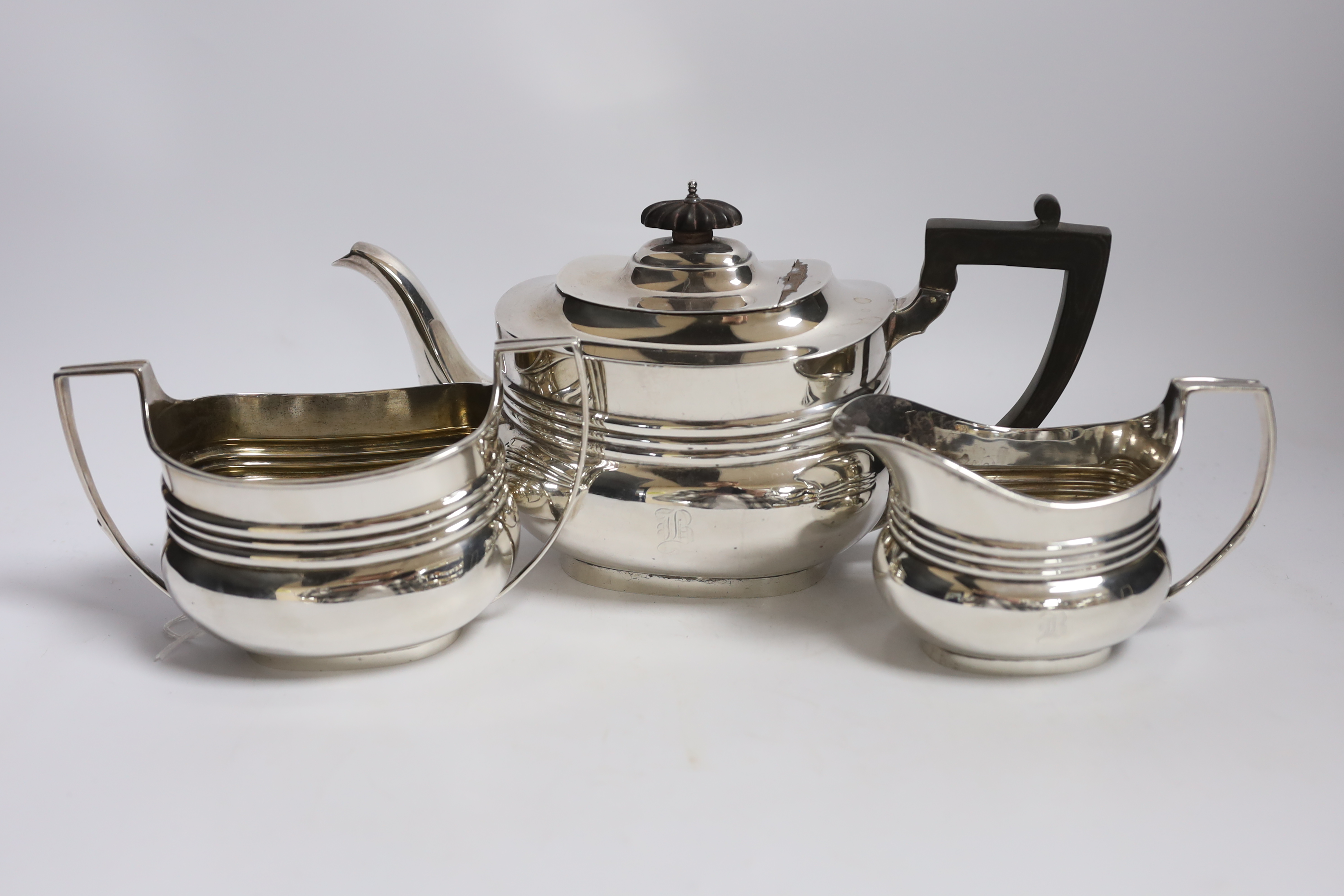 An early 20th century three piece silver tea set, by William Barnard & Sons Ltd, London, 1908/11, - Image 2 of 3