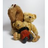 A Chad Valley teddy bear, 34cm high, a smaller bear in velvet clothes and a Merrythought horse