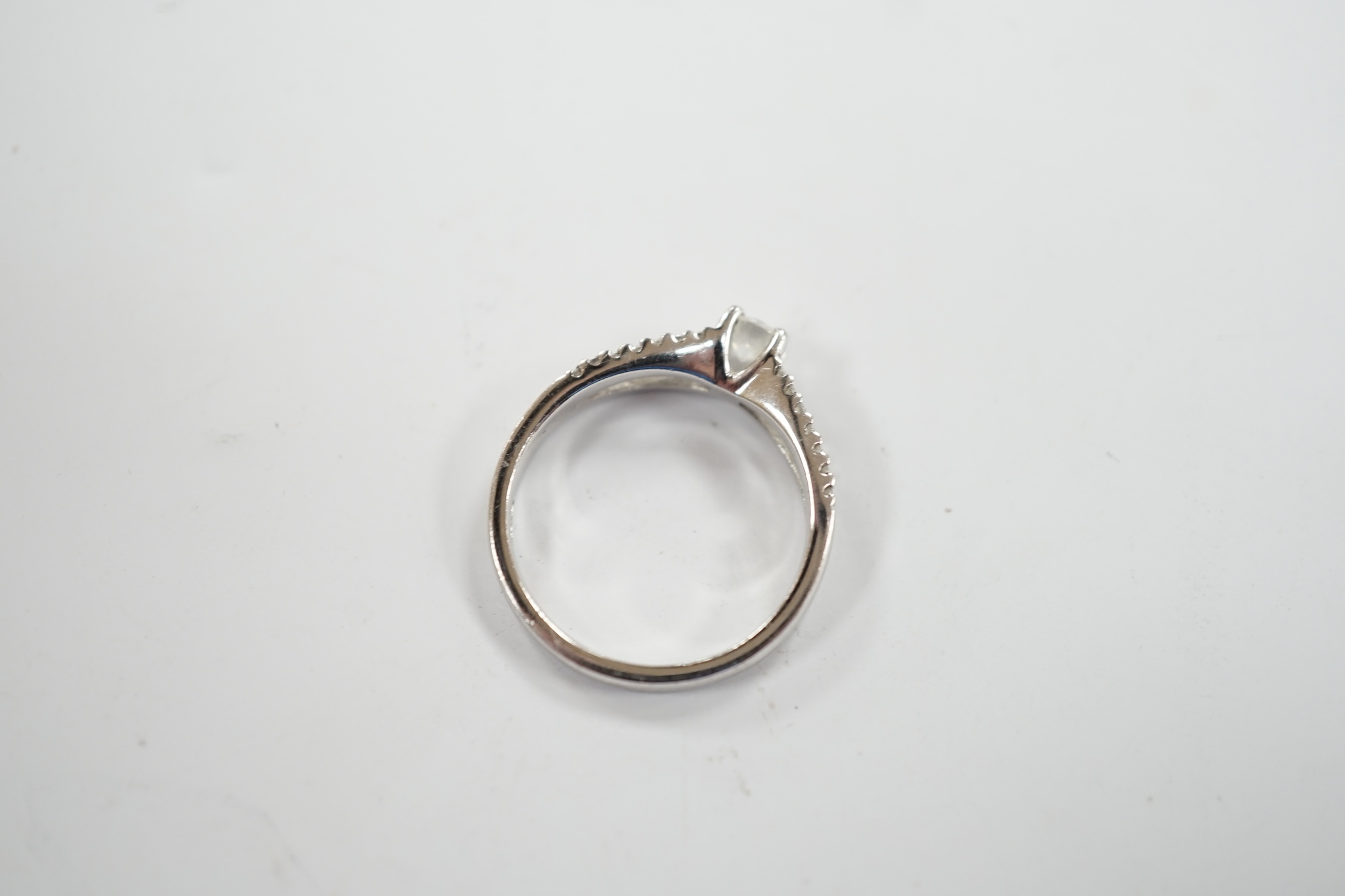 A modern 18ct white gold and single stone diamond set ring, with diamond chip set split shoulders, - Image 4 of 4