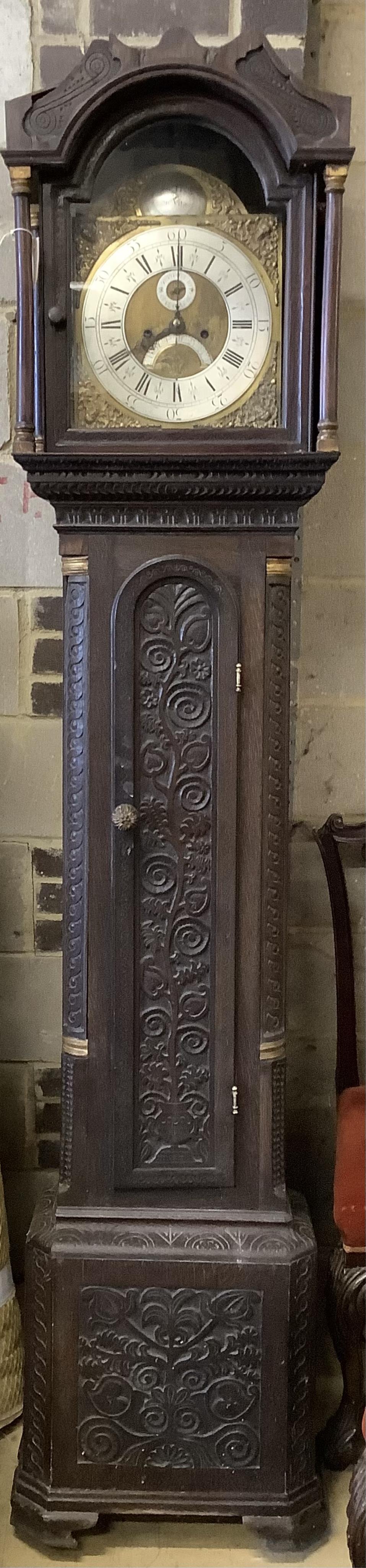 A George III oak cased eight day longcase clock, height 220cm