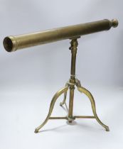 A brass tripod telescope, 65cm wide