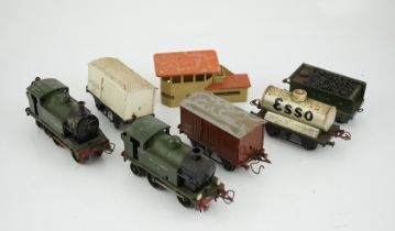 Fourteen 0 gauge tinplate etc. railway items, including three clockwork locomotives; an LSWR 4-4-0