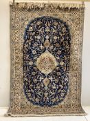 A North West Persian blue ground carpet, 260 x 168cm