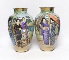 A pair of early 20th century Japanese enamelled porcelain ‘Bijin’ vases, 32cm