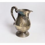 A George II silver baluster ale jug, on pedestal foot, Henry Brind, London, 1744, height 23.5cm,