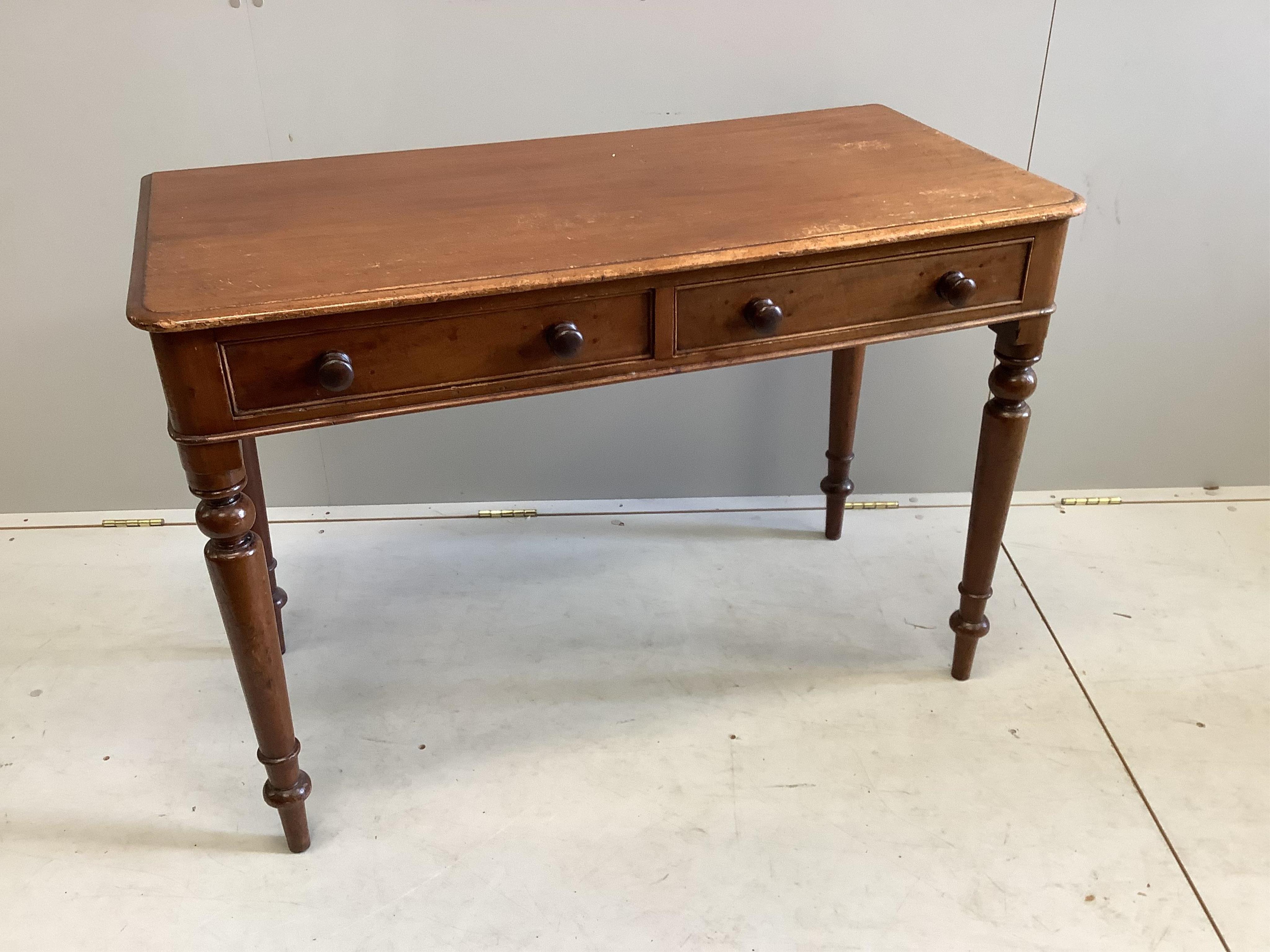 A Victorian mahogany two drawer side table, width 106cm, depth 51cm, height 74cm