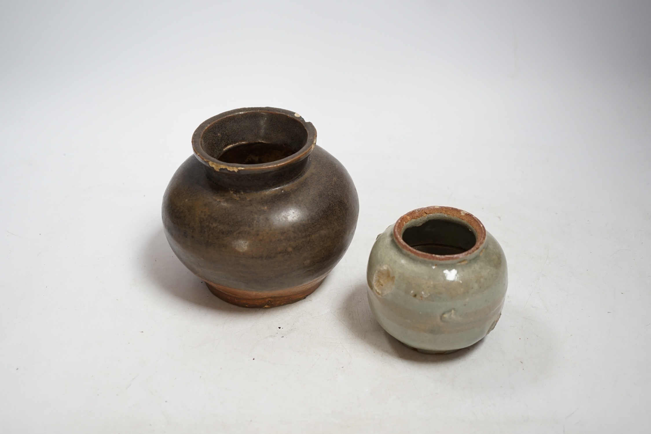 A Chinese brown partially glazed jar and a celadon jar, Song Dynasty largest 13cm in diameter - Image 2 of 4