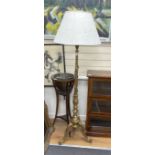 A carved giltwood tripod standard lamp, height including shade 173cm