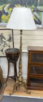 A carved giltwood tripod standard lamp, height including shade 173cm