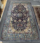 A North West Persian blue ground carpet, 270 x 158cm
