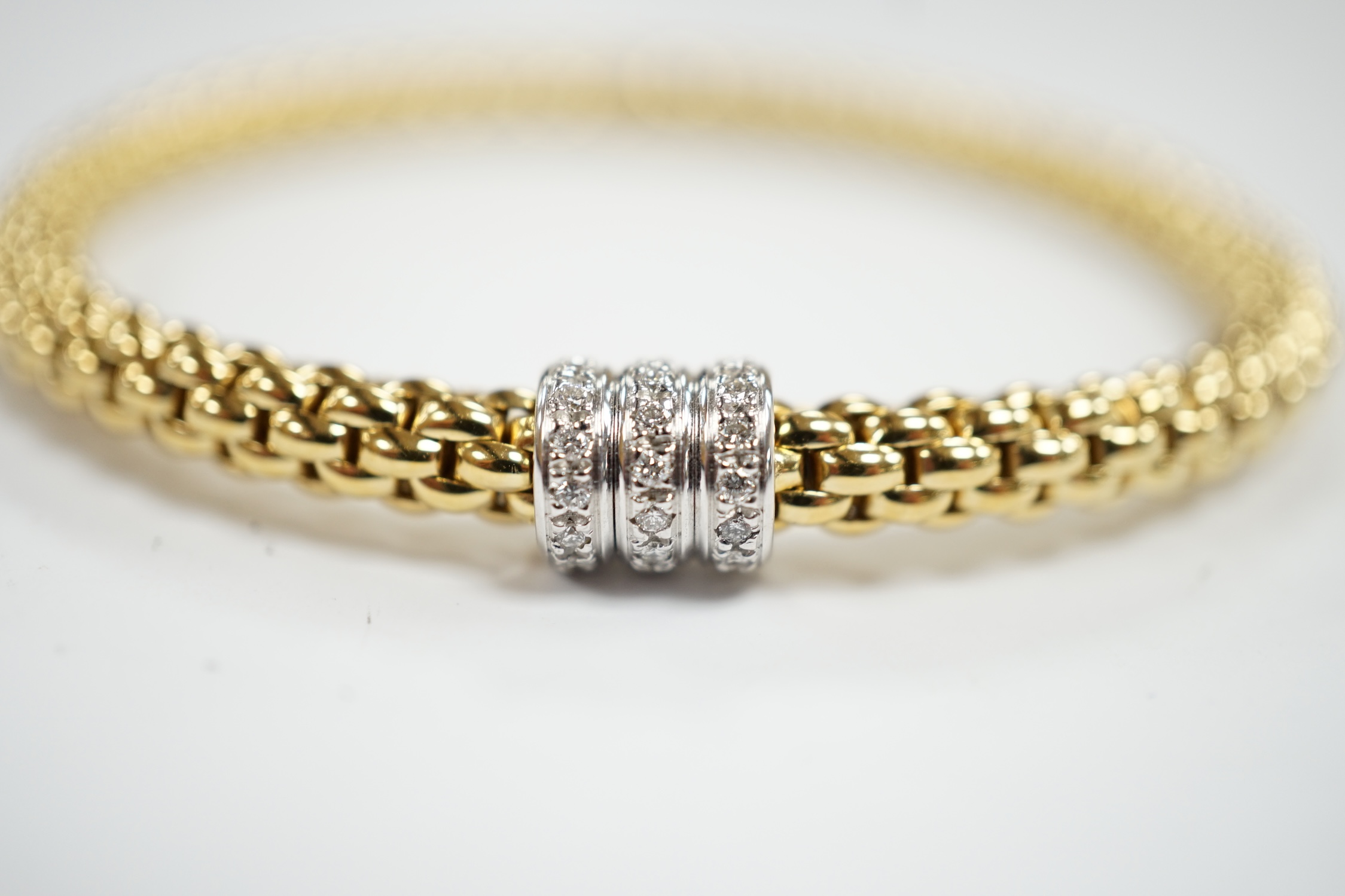 An Italian 18kt Fope flexible bracelet, with diamond chip set barrel shaped motif, gross weight 17.1 - Image 2 of 3