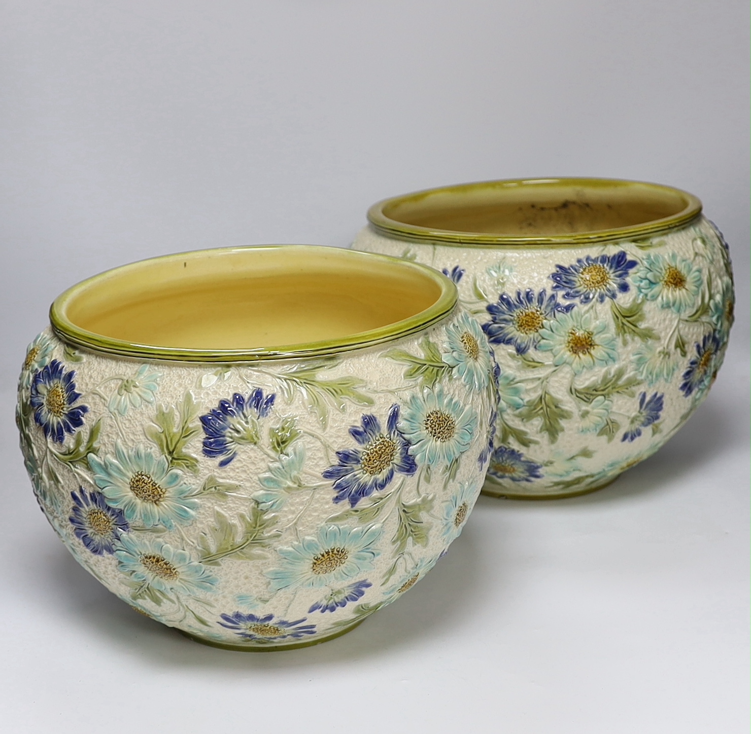 A pair of Burmantofts faience floral jardinières, c.1900, 23cm