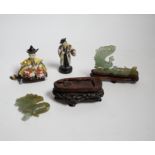 Four Chinese figures, including two jadeite examples, largest 7.5cm wide