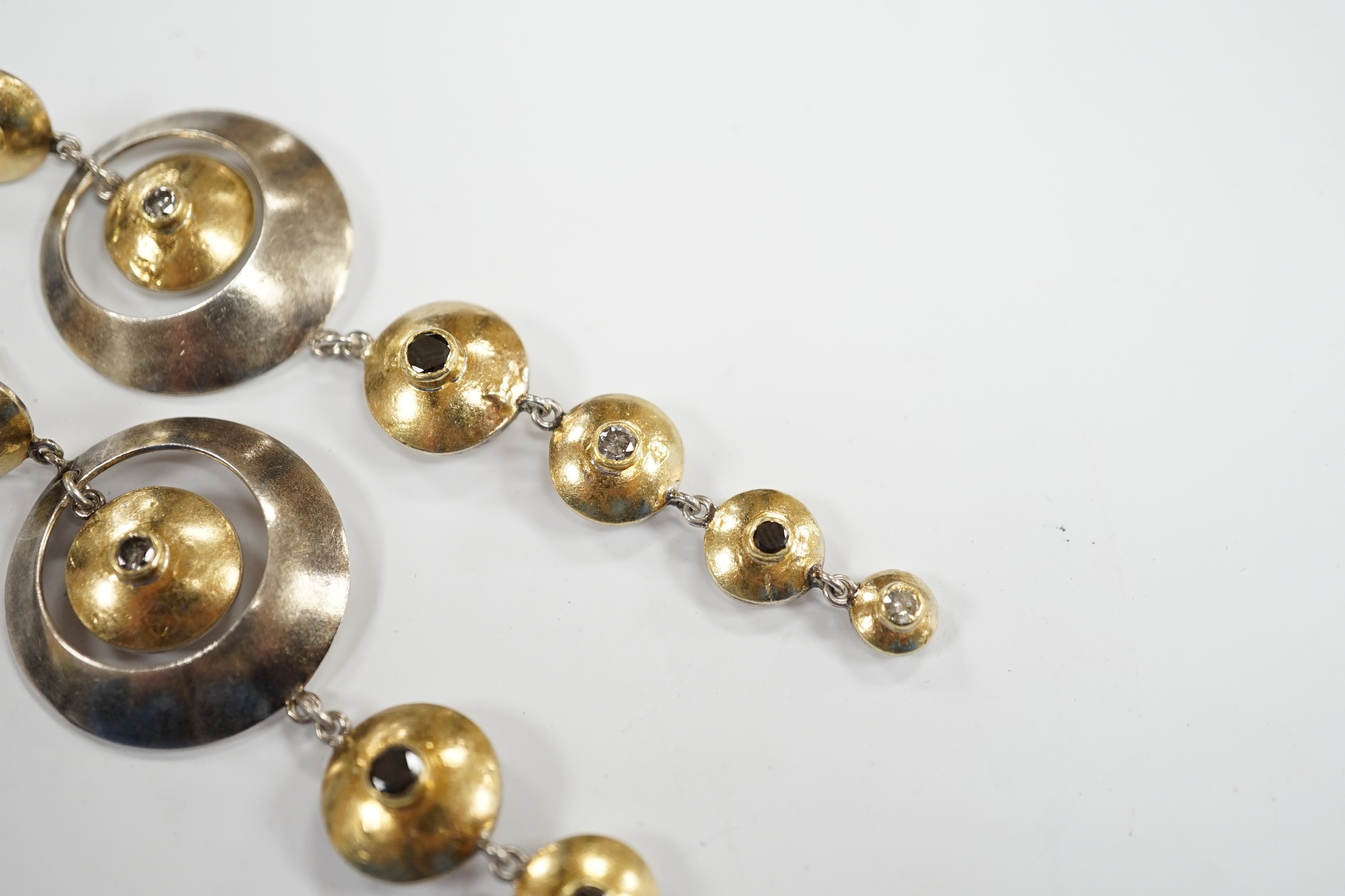 A pair of yellow and white metal diamond and black onyx set graduated disc drop earrings, 93mm. - Image 3 of 6