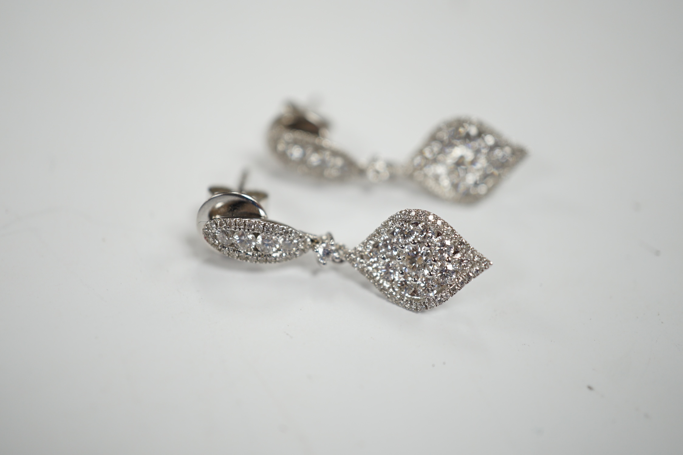 A modern pair of 750 white metal and diamond cluster set drop earrings, of elliptical form, 26mm, - Image 2 of 5