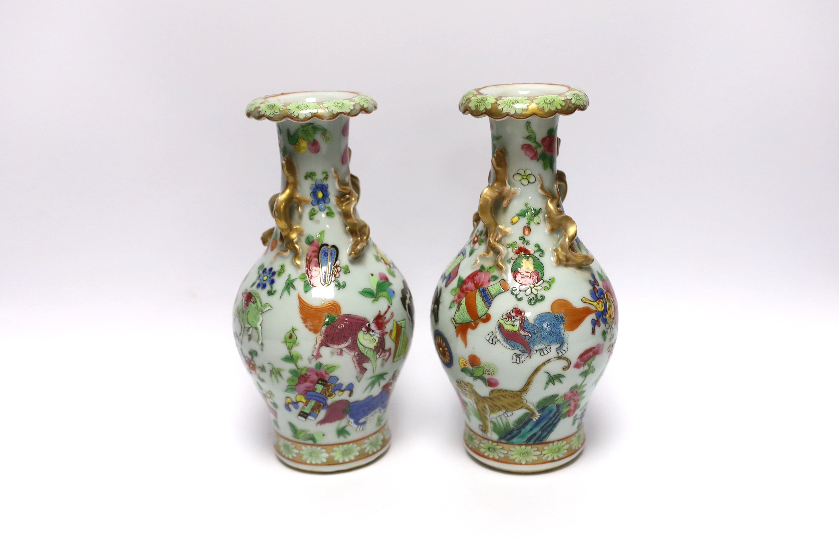 A pair of 19th century Chinese famille rose ‘mythical beasts’ vases, 24cm - Image 2 of 4