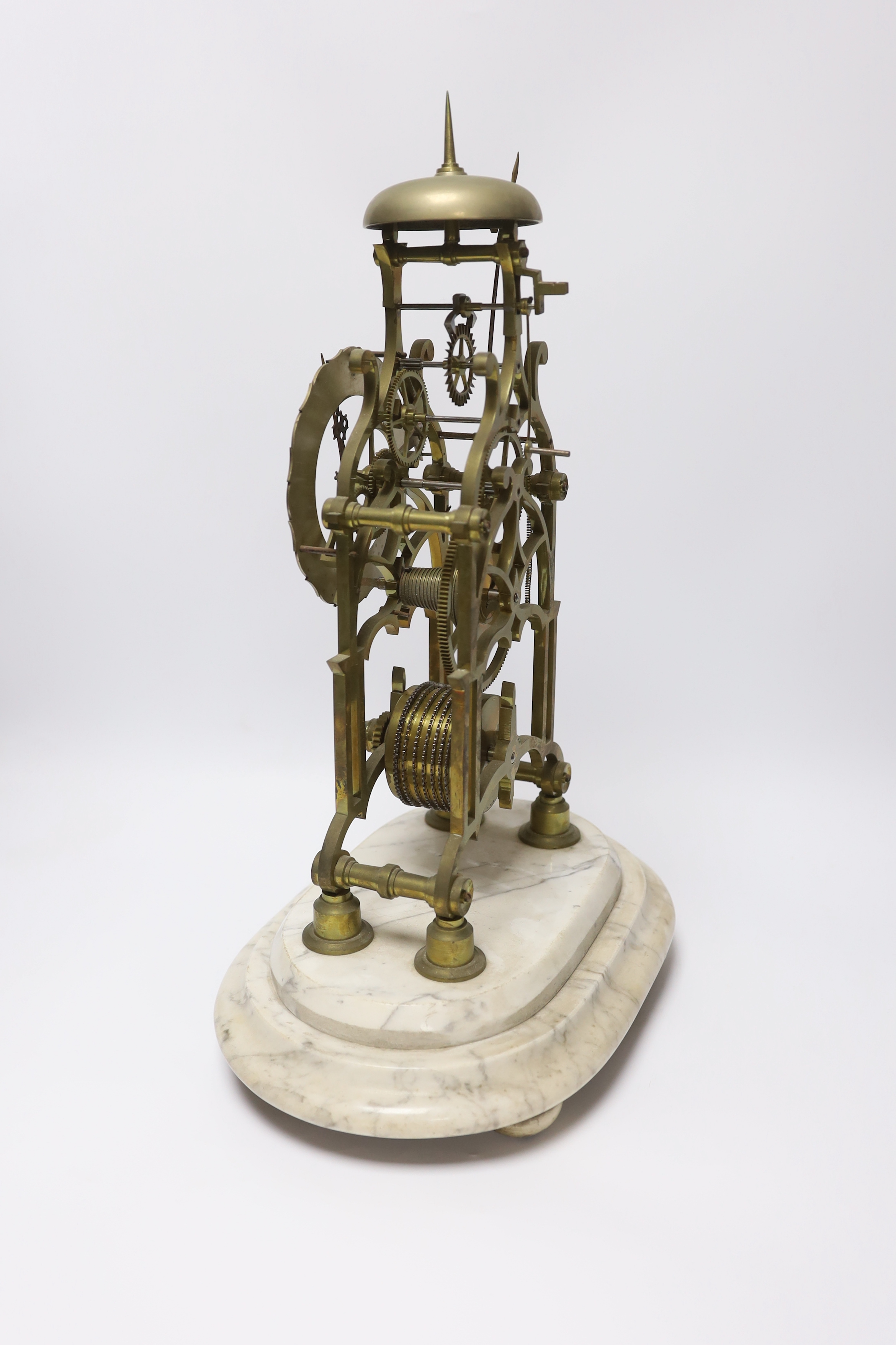 A skeleton clock with Roman numeral dial, raised on white marble base, pendulum and key, 45cm - Image 3 of 3