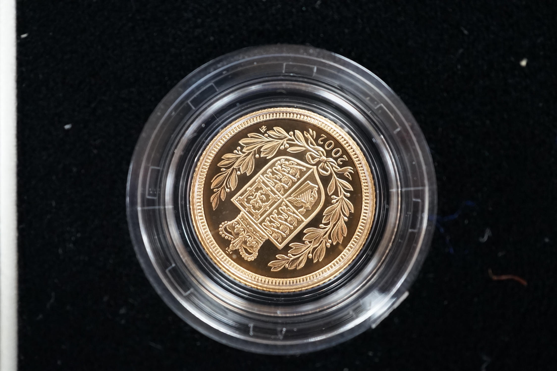 A cased 2002 United Kingdom gold proof sovereign three coin collection, with certificate. - Image 2 of 5