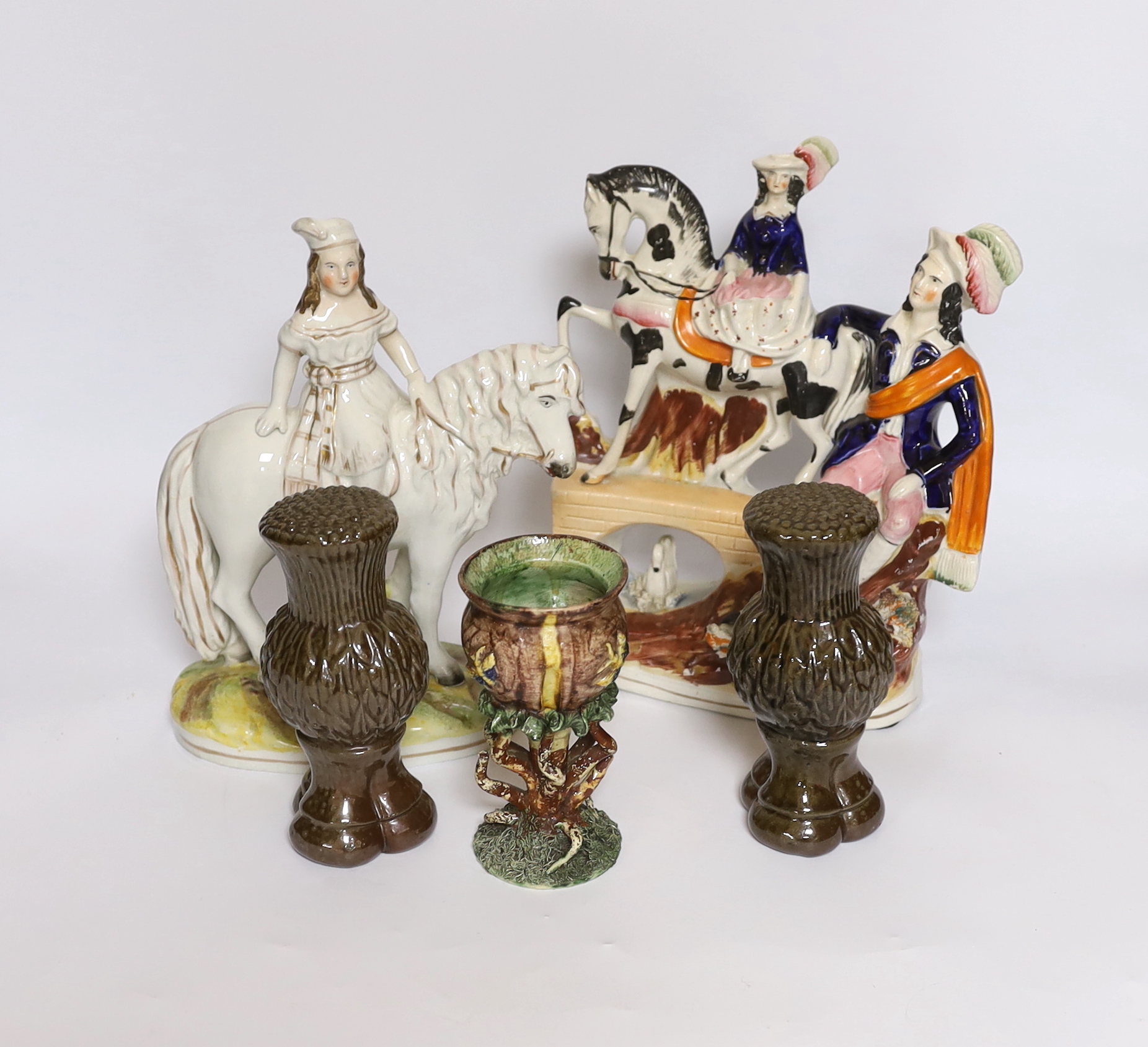 A rare Staffordshire horse group, a Princess Royal and pony group, a Palissy ware vase and a pair of