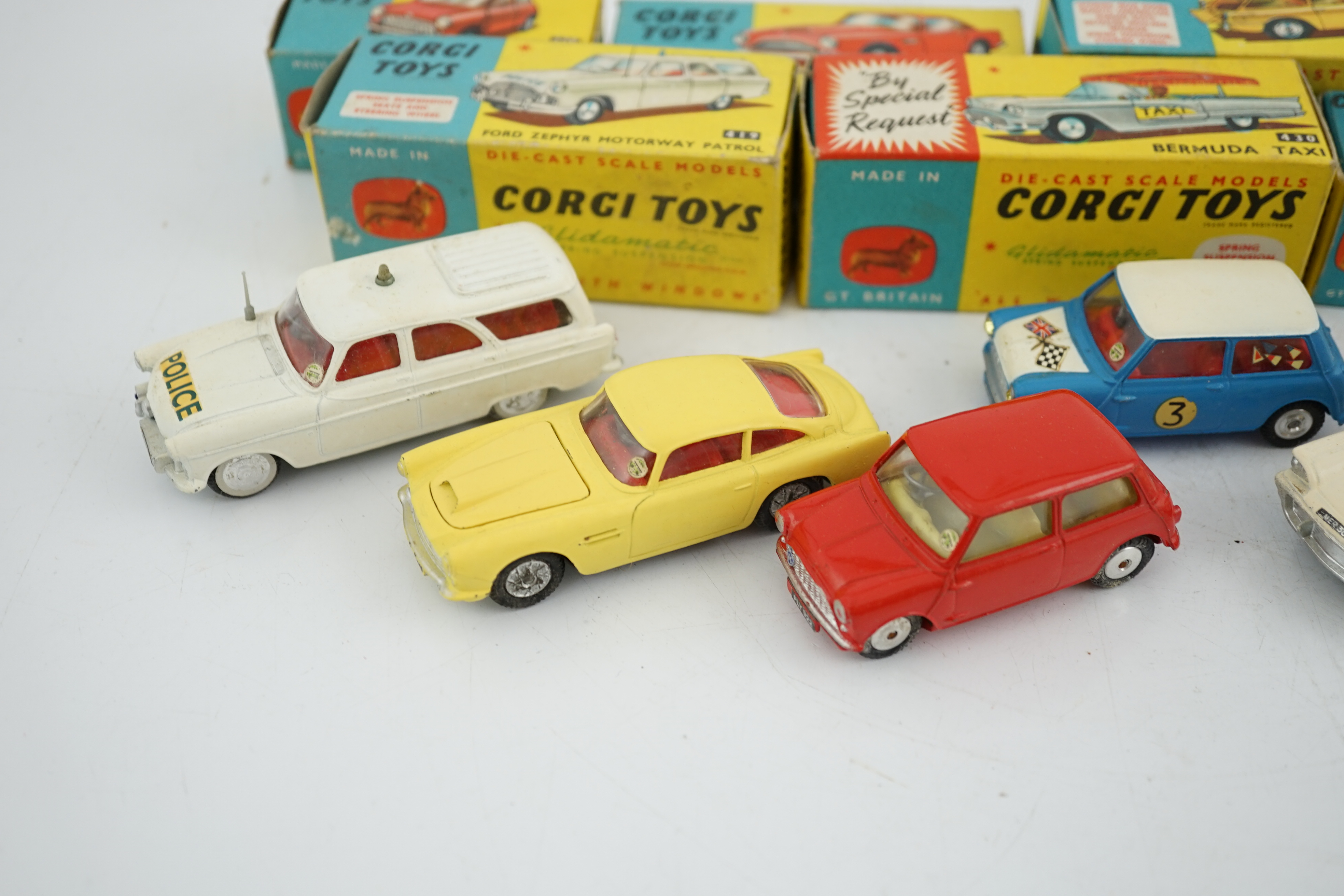 Six boxed Corgi Toys cars; Aston Martin DB4 in yellow (218), Austin seven in red (225), Morris - Image 2 of 8