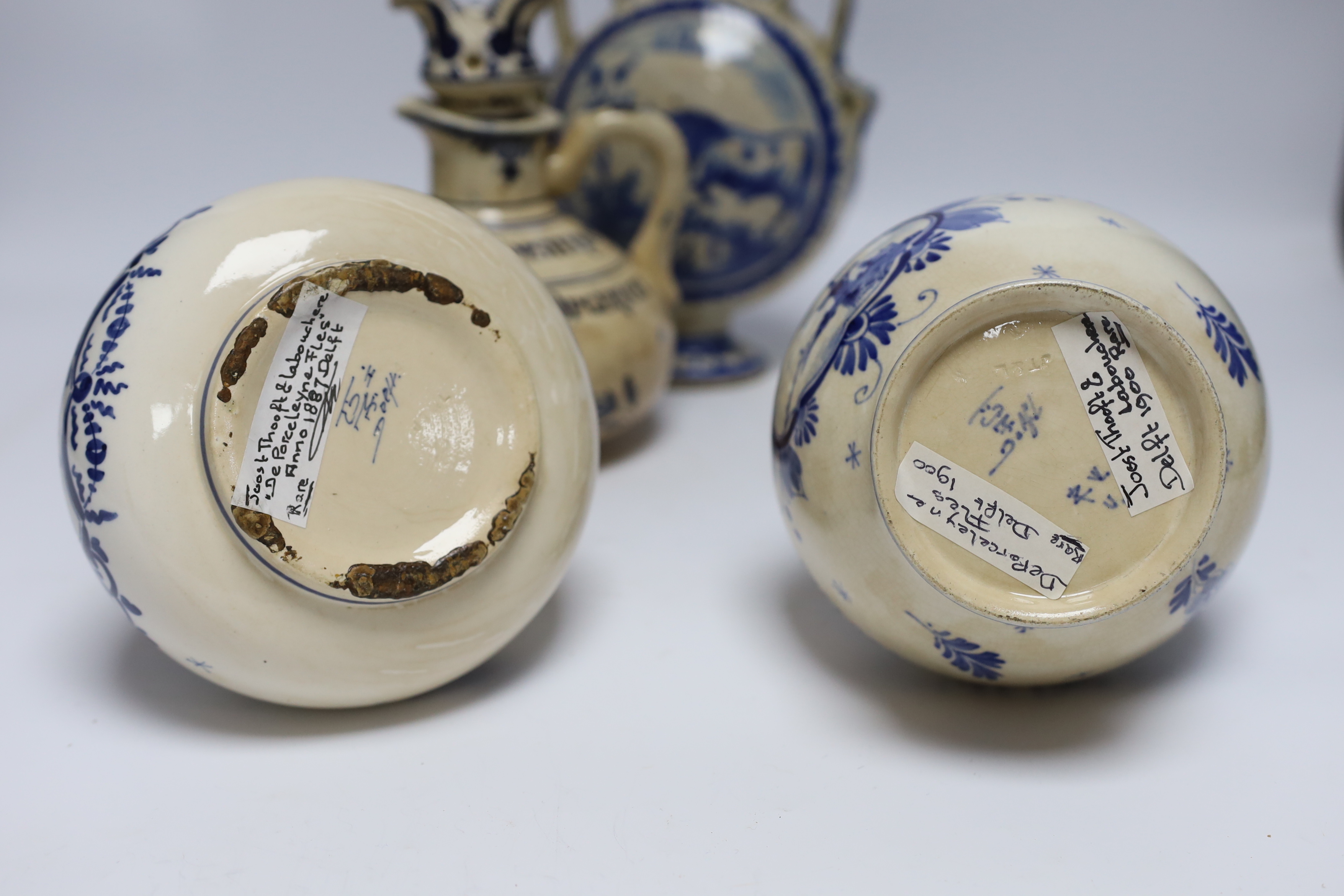 A Delft moonflask and three Delft jugs, largest 22cm - Image 4 of 5