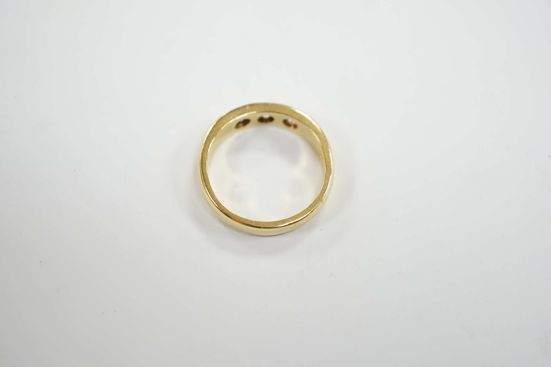 A modern 18ct gold and gypsy set three stone diamond ring, size R, gross weight 7.6 grams. - Image 3 of 3