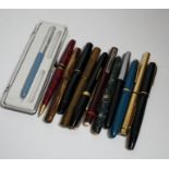 A quantity of fountain pens including Watermans and Sheaffer