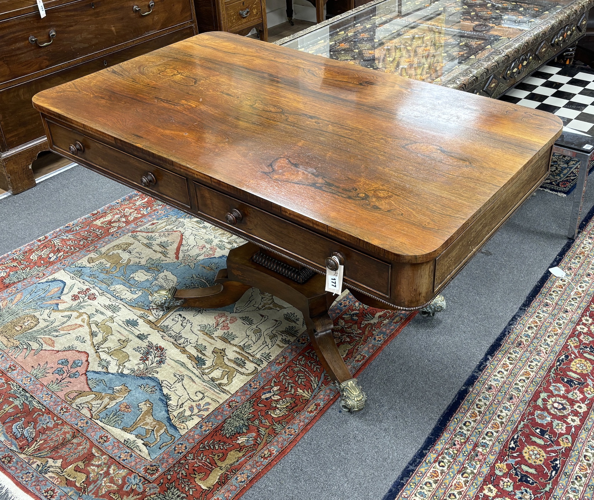 A Regency rectangular rosewood centre / library table, fitted two frieze drawers and two dummy - Bild 3 aus 4