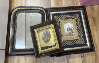 Three framed photos and a mirror