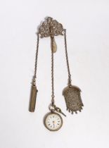 A late Victorian pierced silver chatelaine by Levi & Salaman, Birmingham, 1900, hung with three