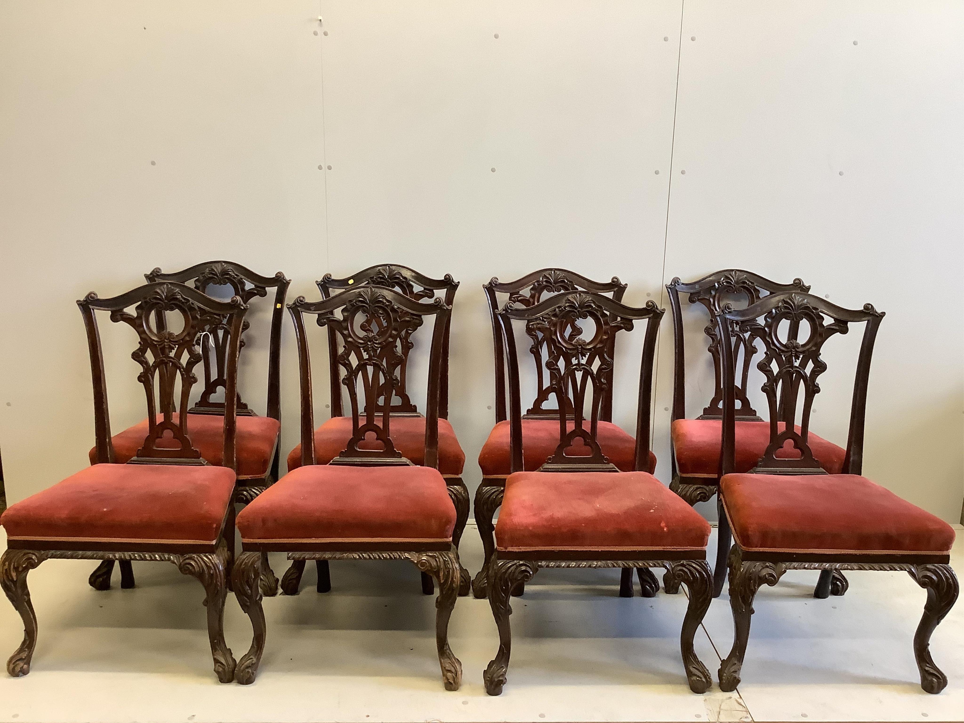 A set of eight Victorian mahogany Chippendale style dining chairs having carved and pierced