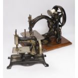 A Victorian Wilcox and Gibbs sewing machine and a smaller sewing machine, 28cm high