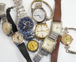 A group of assorted mainly steel wrist watches including three Cyma, a Roamer and modern Citizen