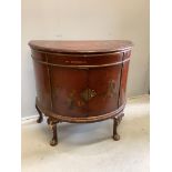An early 20th century scarlet chinoiserie lacquer D shaped side cabinet, width 95cm, depth 49cm,