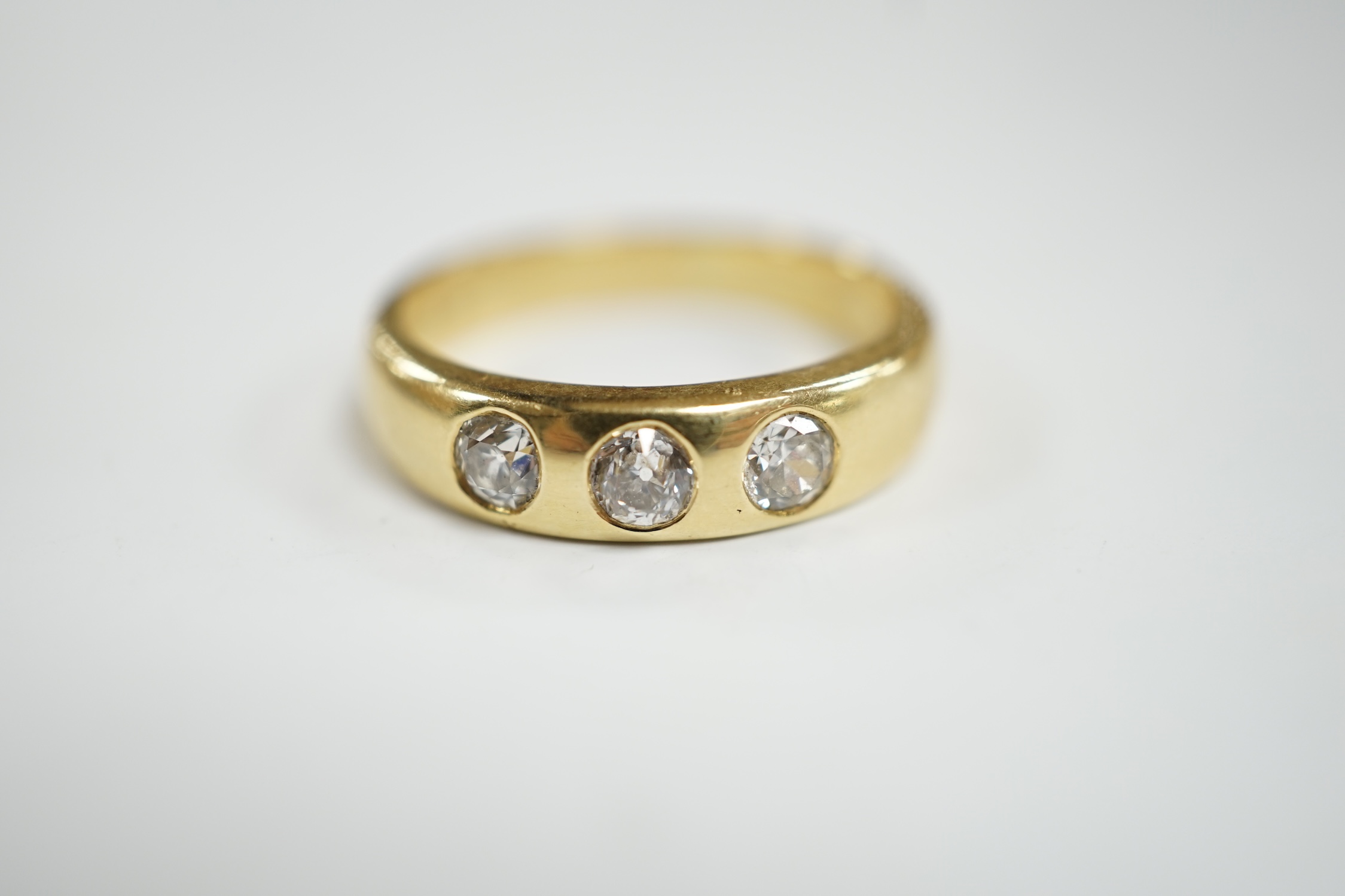A modern 18ct gold and gypsy set three stone diamond ring, size R, gross weight 7.6 grams. - Image 2 of 3