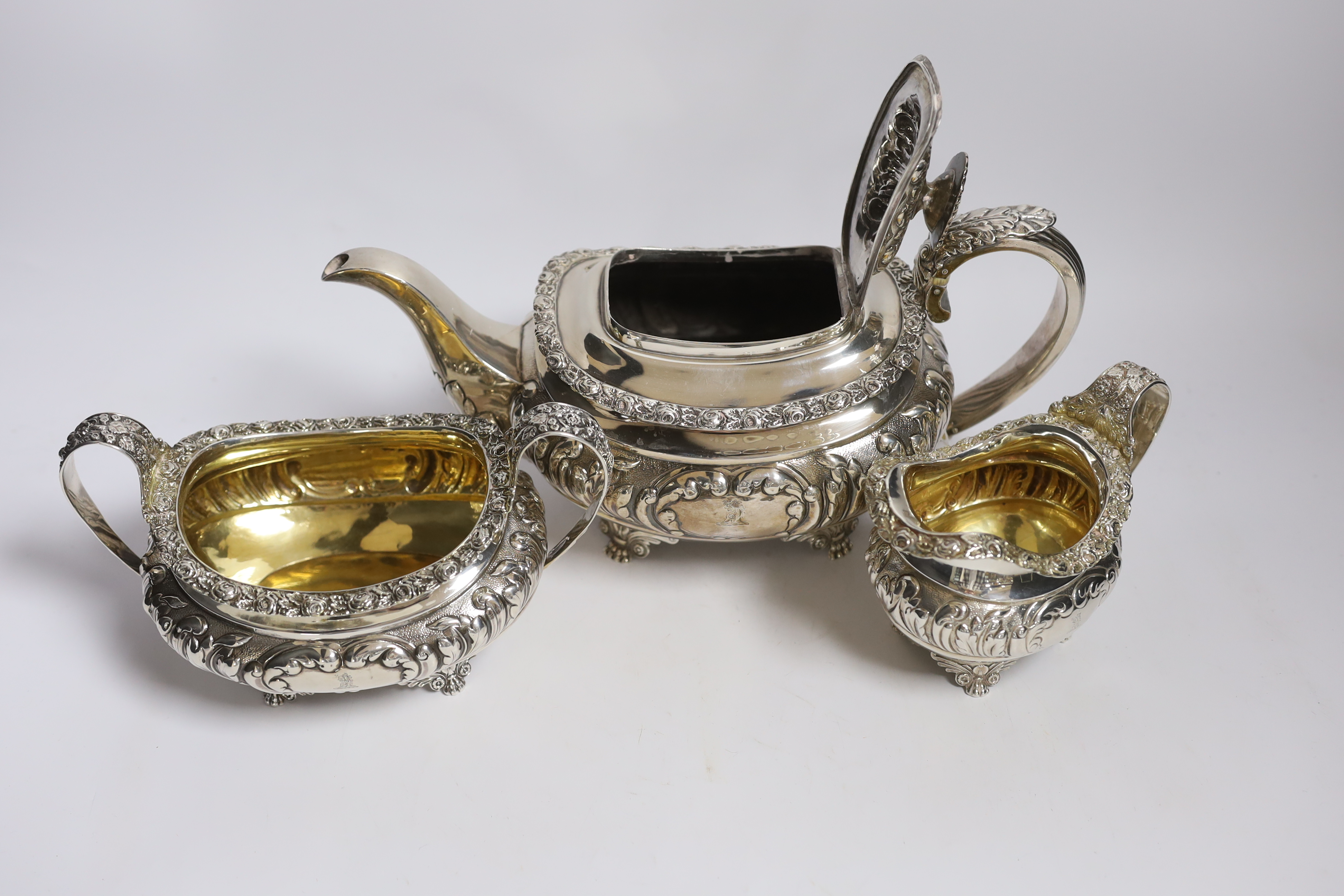 A George IV silver three piece oval tea set, on winged paw feet, by Naphtali Hart, London 1820, - Image 2 of 3