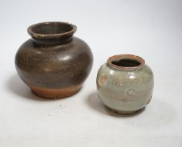 A Chinese brown partially glazed jar and a celadon jar, Song Dynasty largest 13cm in diameter
