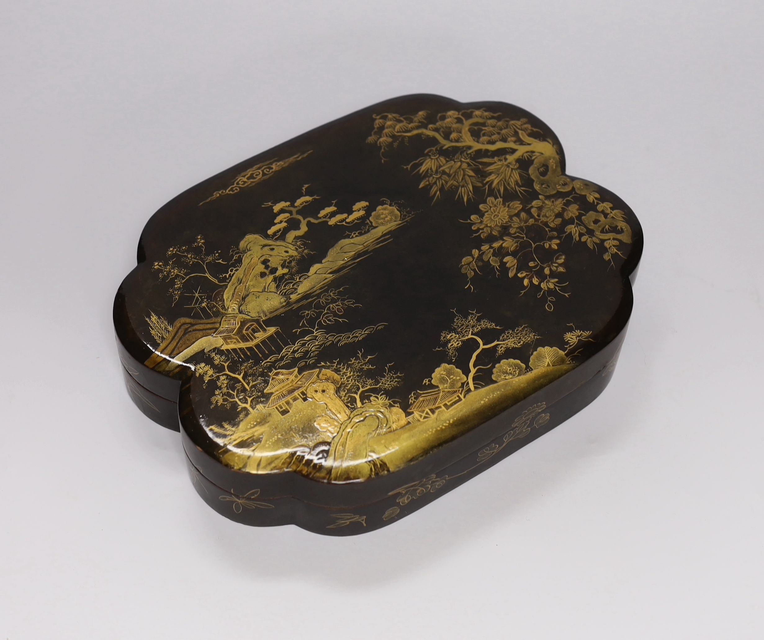 An early 20th century Japanese gilt lacquer box containing nine similar boxes, 28cm