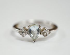 A modern Italian Comete 18k white metal and single stone pear cut aquamarine set ring, with eight
