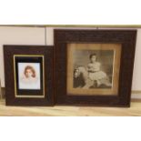 A large photographic print, Infant on rocking horse, housed in a carved frame ‘Russel, 1891’, and