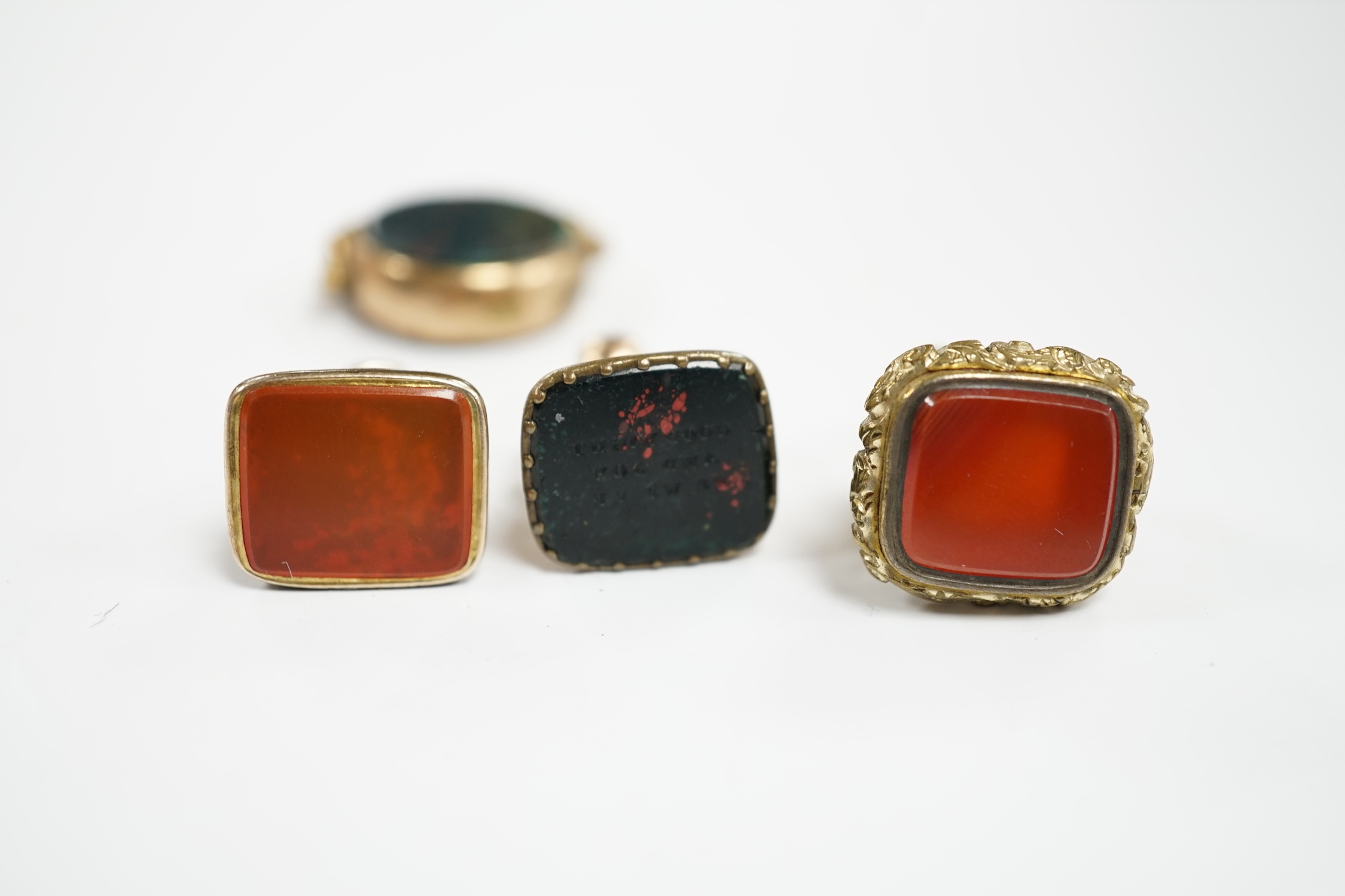 Four assorted 19th century fob seals including a 9ct and chalcedony set spinning fob, 32mm. - Image 4 of 4