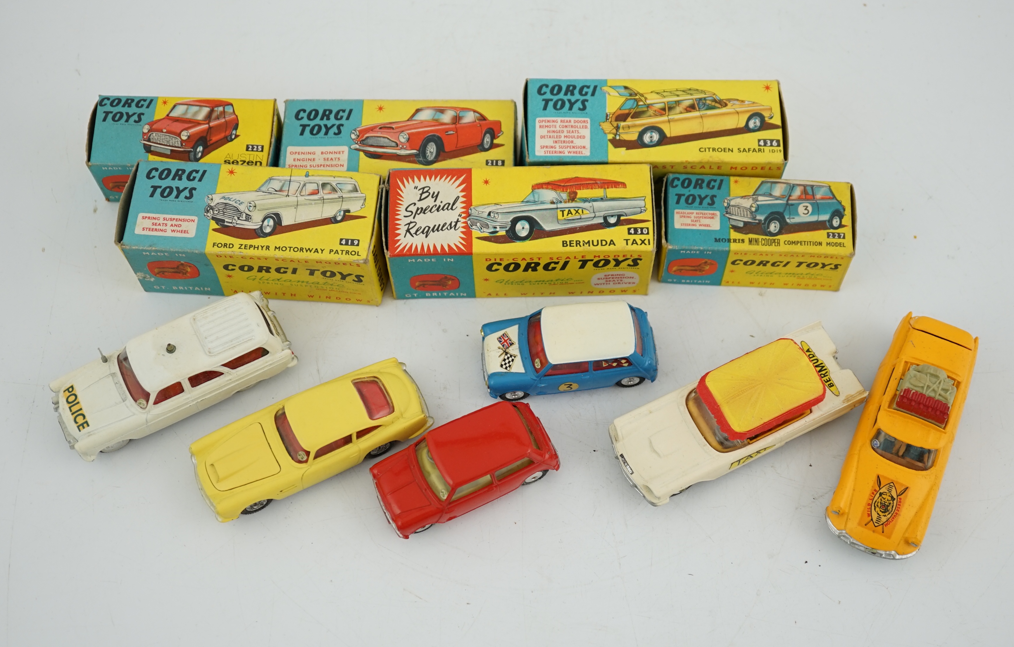 Six boxed Corgi Toys cars; Aston Martin DB4 in yellow (218), Austin seven in red (225), Morris - Image 4 of 8