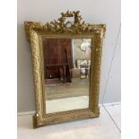 A late 19th century French giltwood and composition wall mirror, re-painted, width 81cm, height