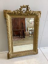 A late 19th century French giltwood and composition wall mirror, re-painted, width 81cm, height