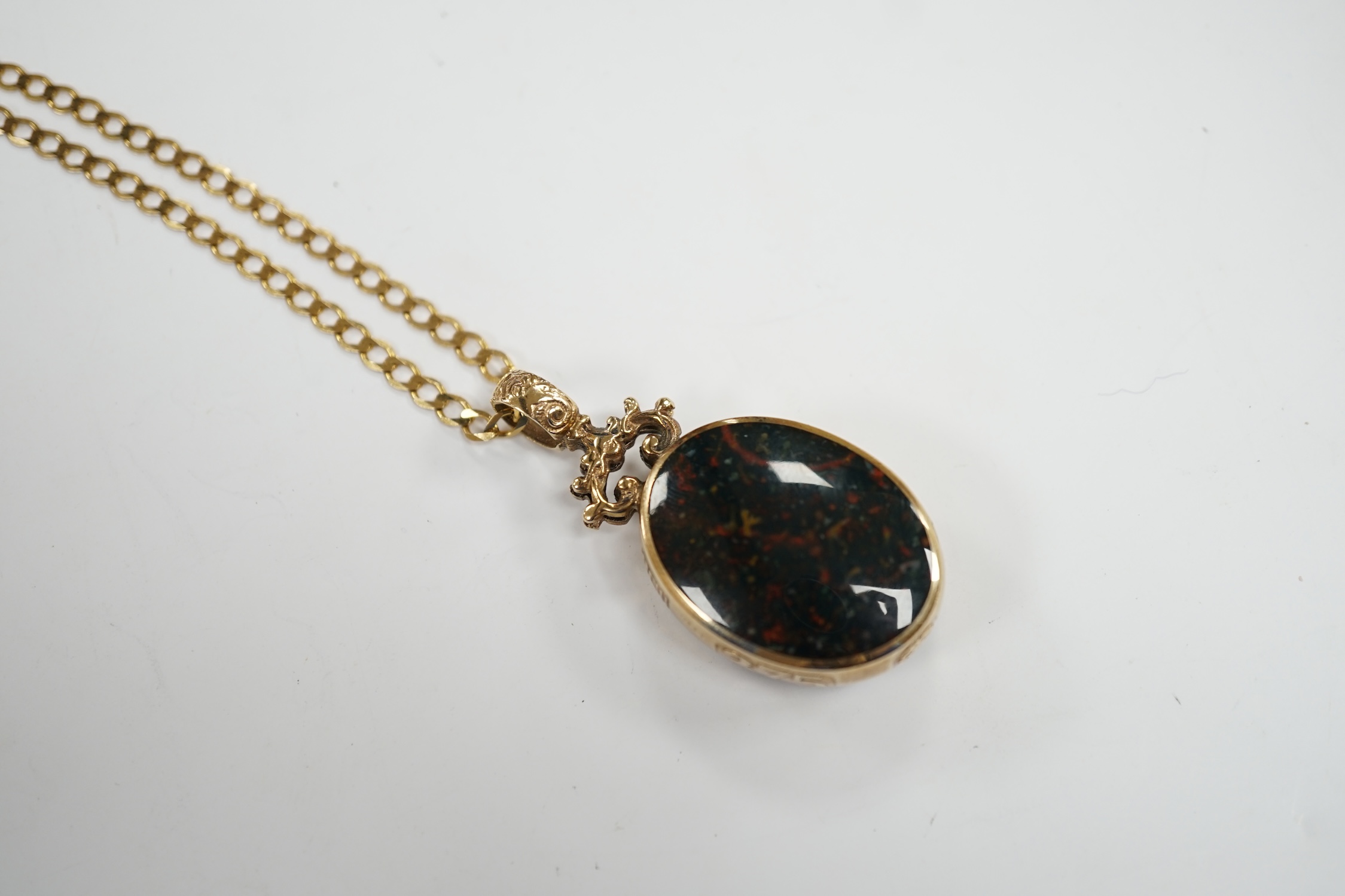 A modern 9ct gold mounted carnelian and bloodstone set oval 'Millennium' pendant, by Davis Scott - Image 2 of 5