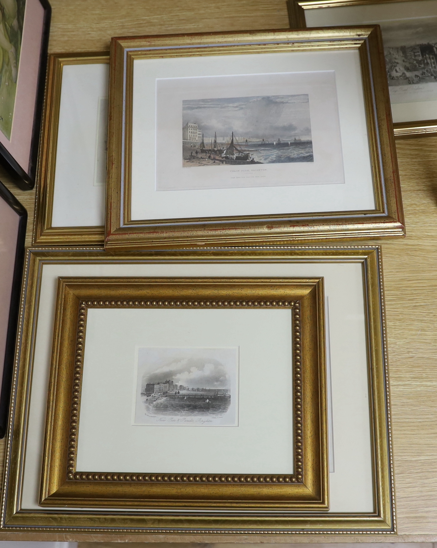 Four 19th century engravings and prints of Brighton Piers, some hand coloured including, ‘Chain Pier
