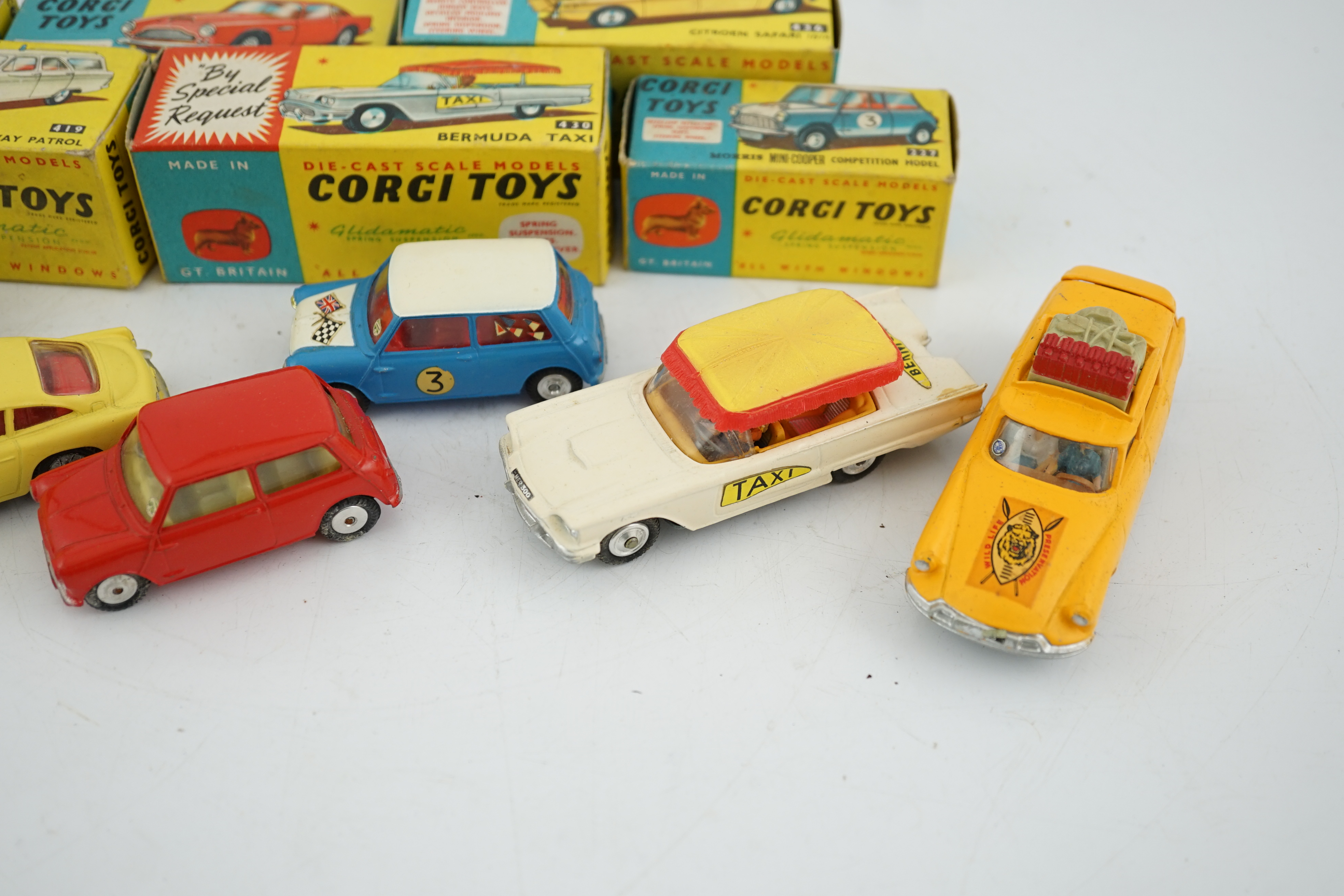 Six boxed Corgi Toys cars; Aston Martin DB4 in yellow (218), Austin seven in red (225), Morris - Image 3 of 8